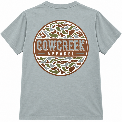 Back of Bay blue-green T-shirt with a large circular Cow Creek Apparel logo in brown, green, and cream camouflage.
